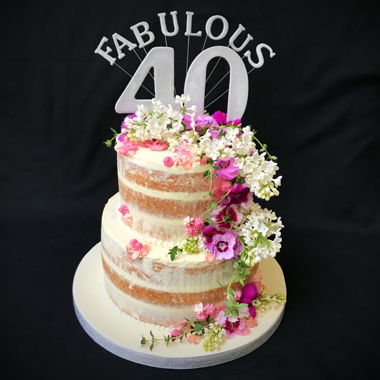 Tart Patisserie - Marbled double barrel 70th birthday cake with hold isomalt  shard